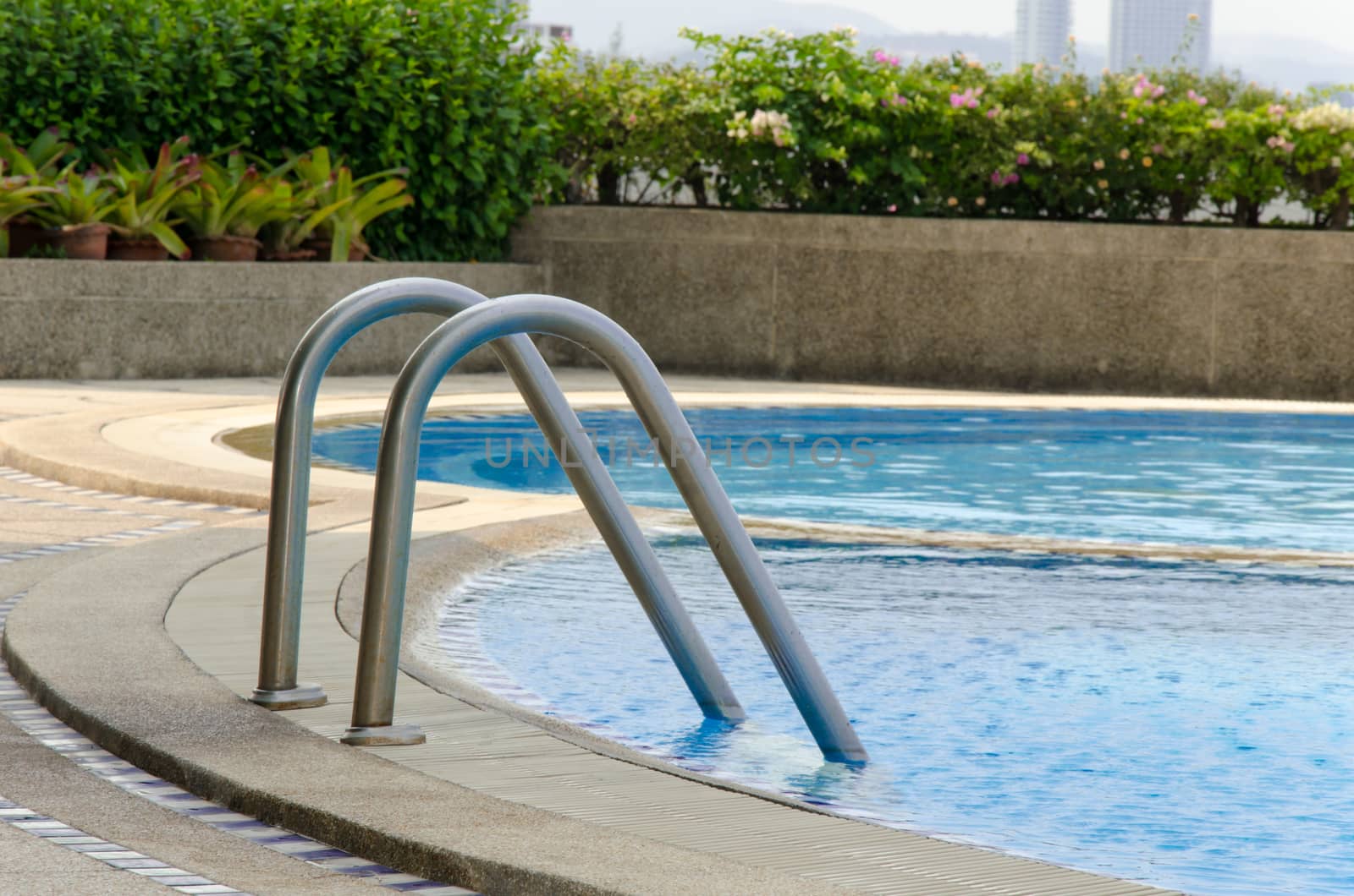 Details of The swimming pool blue water.