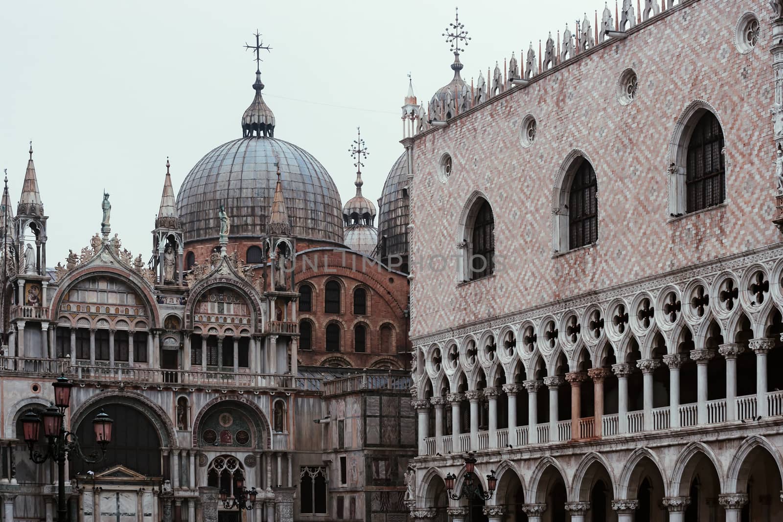 Photo of the architecture in Piazza San Marco in Venice Italy on a dreary day.