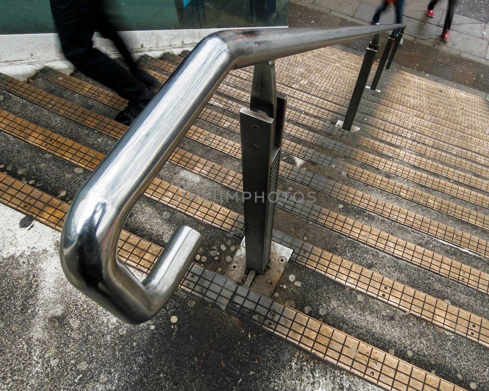 Stairs detail, people going up with motion blur