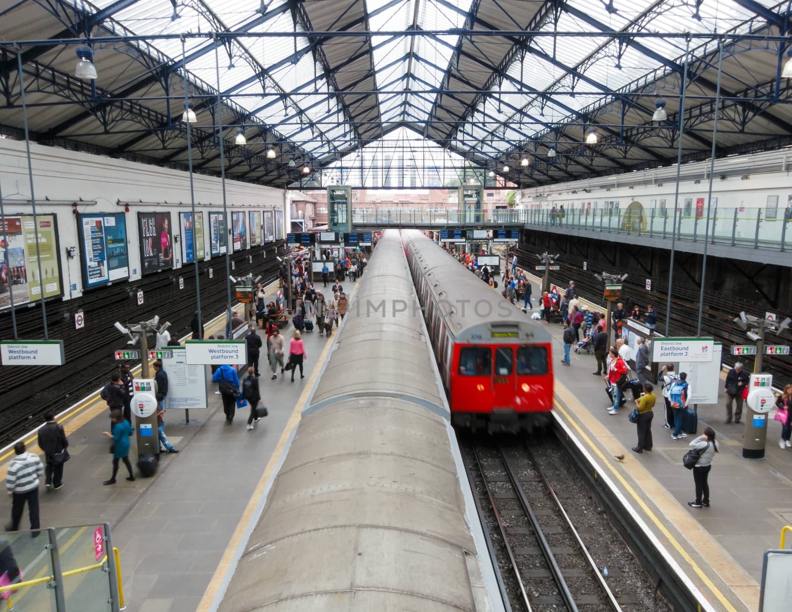 LONDON, UK - CIRCA AUGUST 2012: Train arrives at Earls Court underground station.