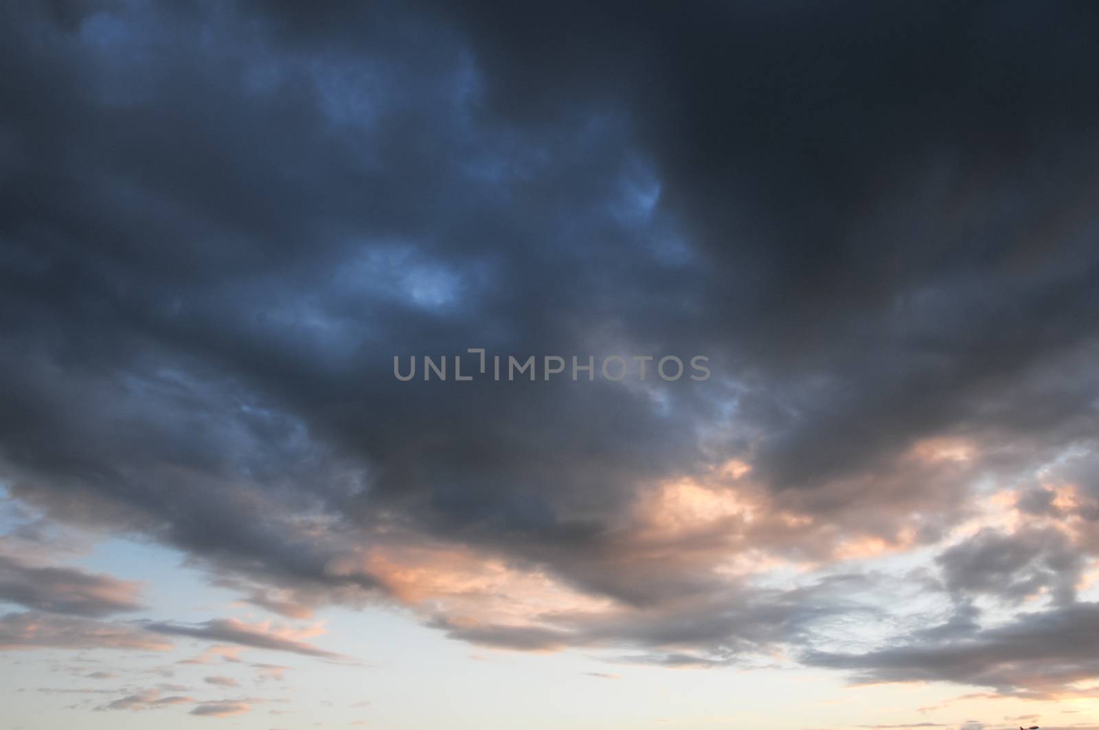 Colored Sunset Clouds Over the Atlantic Ocean in Tenerife South Spain