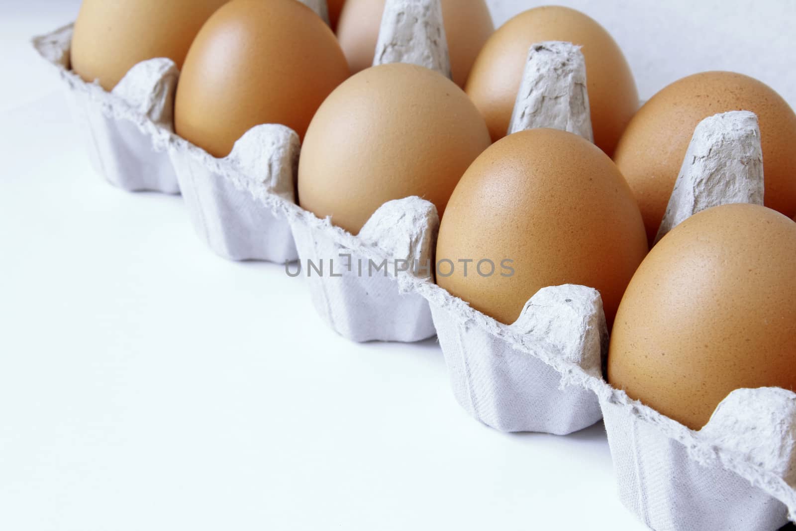 Closeup of eggs in carton