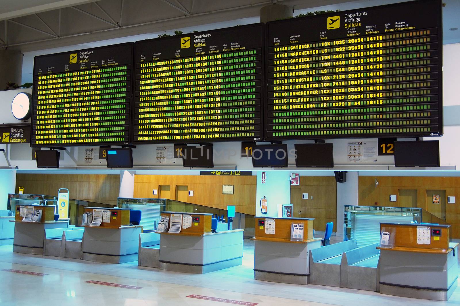 Departure and arrival boards at the airport