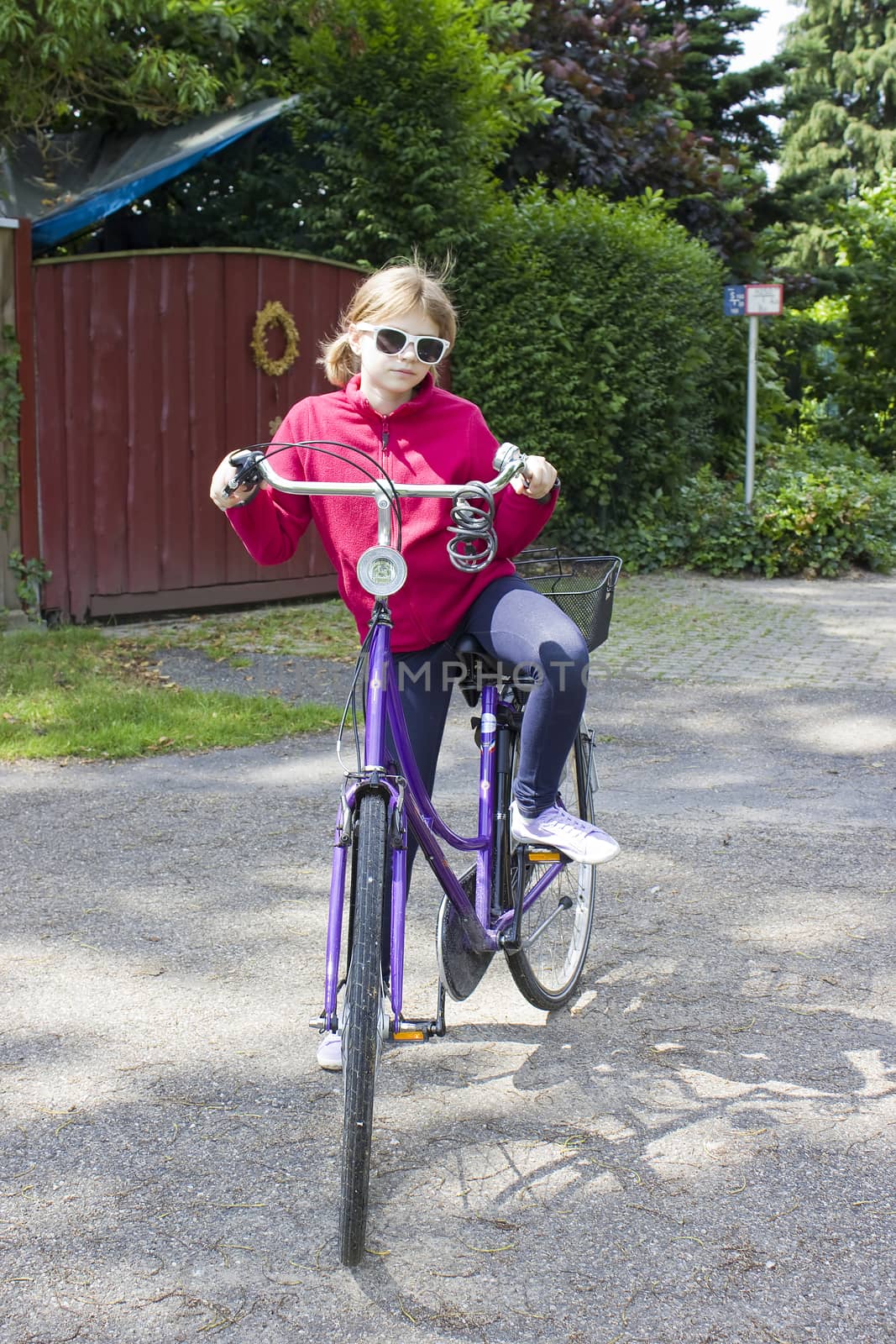 young girl with her bicycle