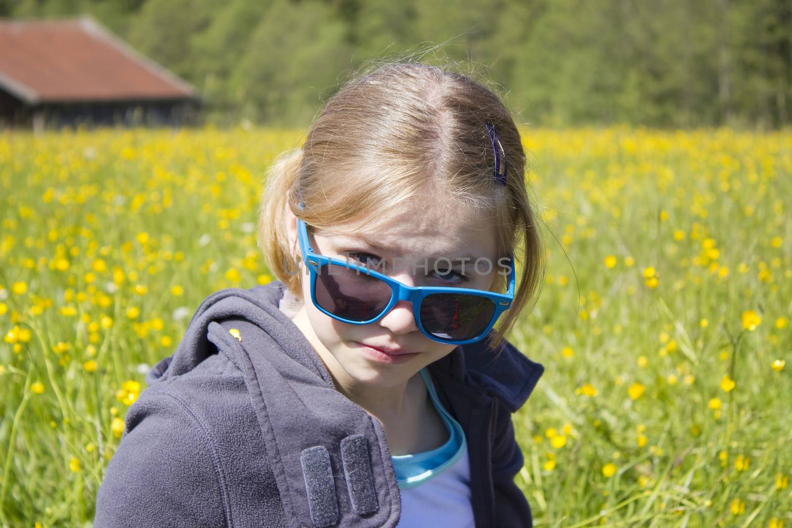 portrait of a child with sunglasses by miradrozdowski