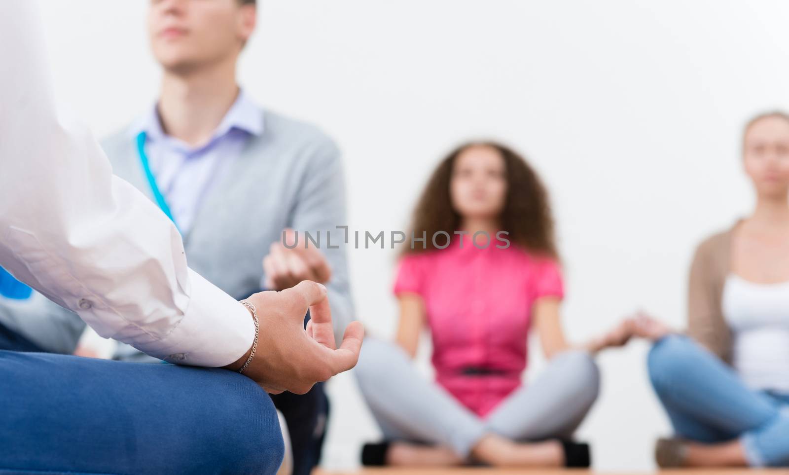 close-up of a human hand, meditates in the workplace