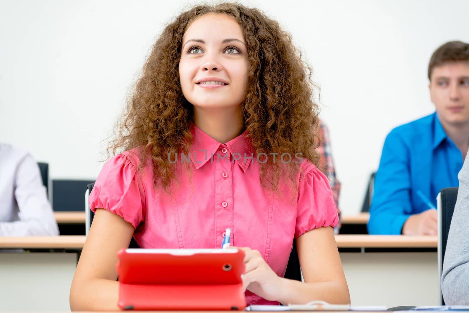 image of a young female student in the classroom, teaching at the University of