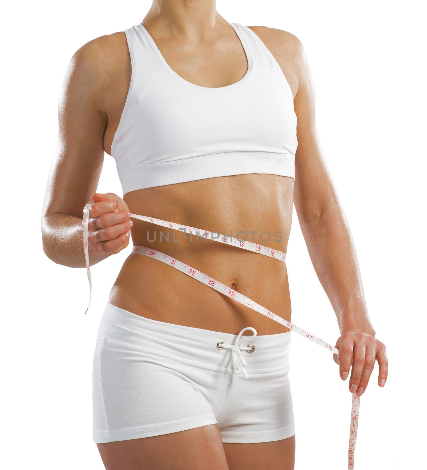 young athletic woman measuring waist measuring tape, isolated on white background