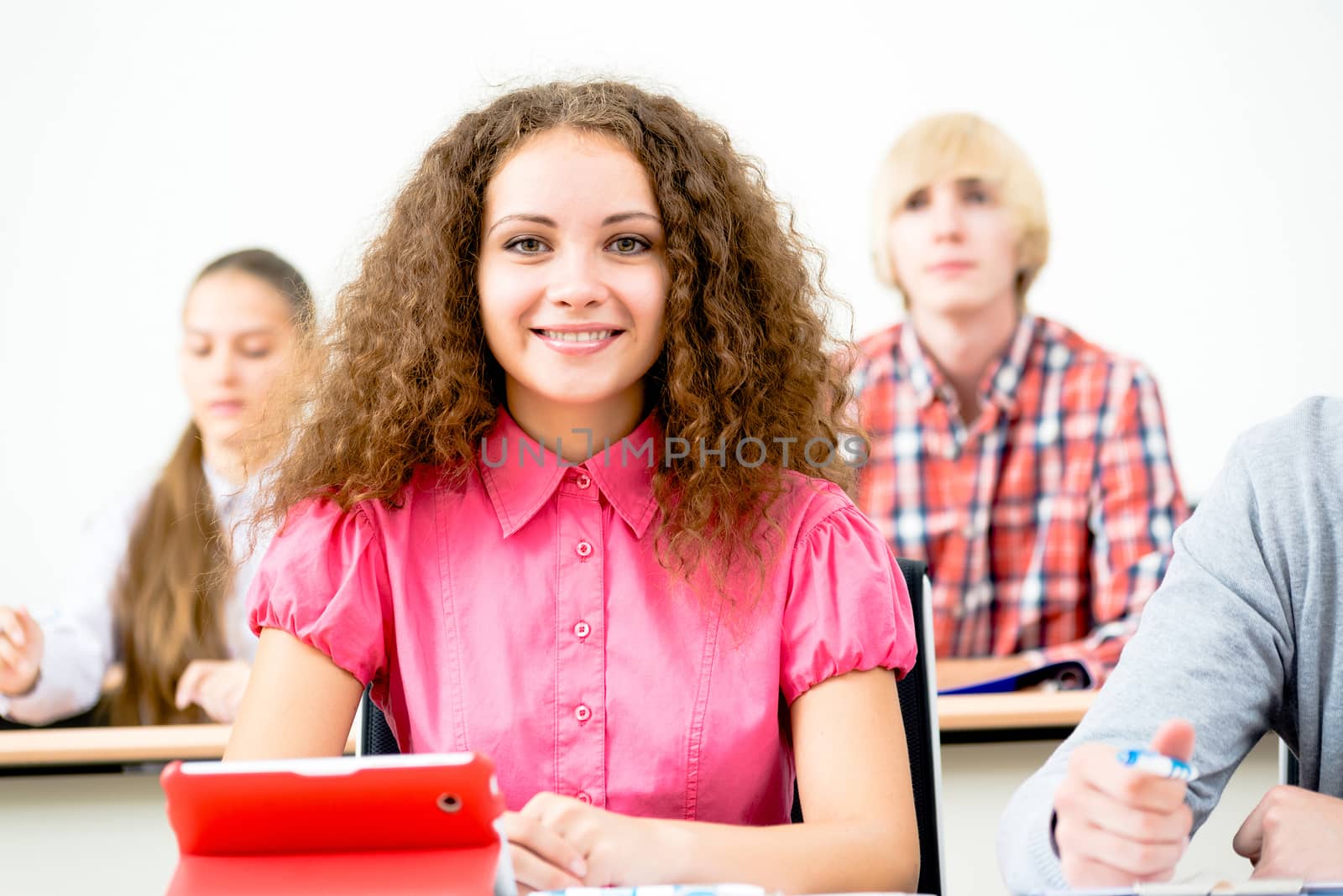 portrait of young female student in the classroom, teaching at the University of