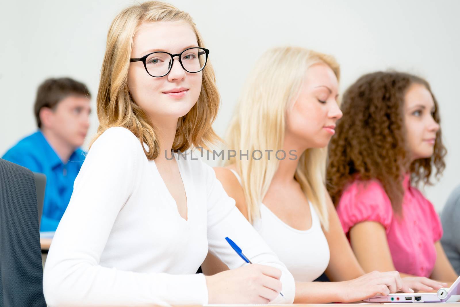 image of a young female students in the classroom, teaching at the University of