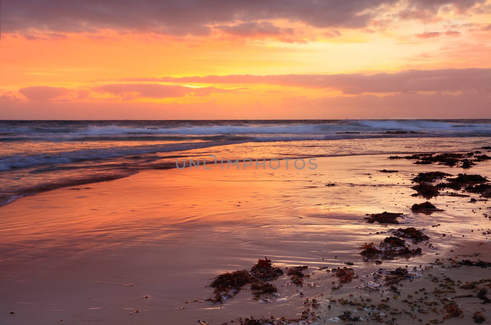 Cloudy sunrise at South Entrance Beach, NSW Australia