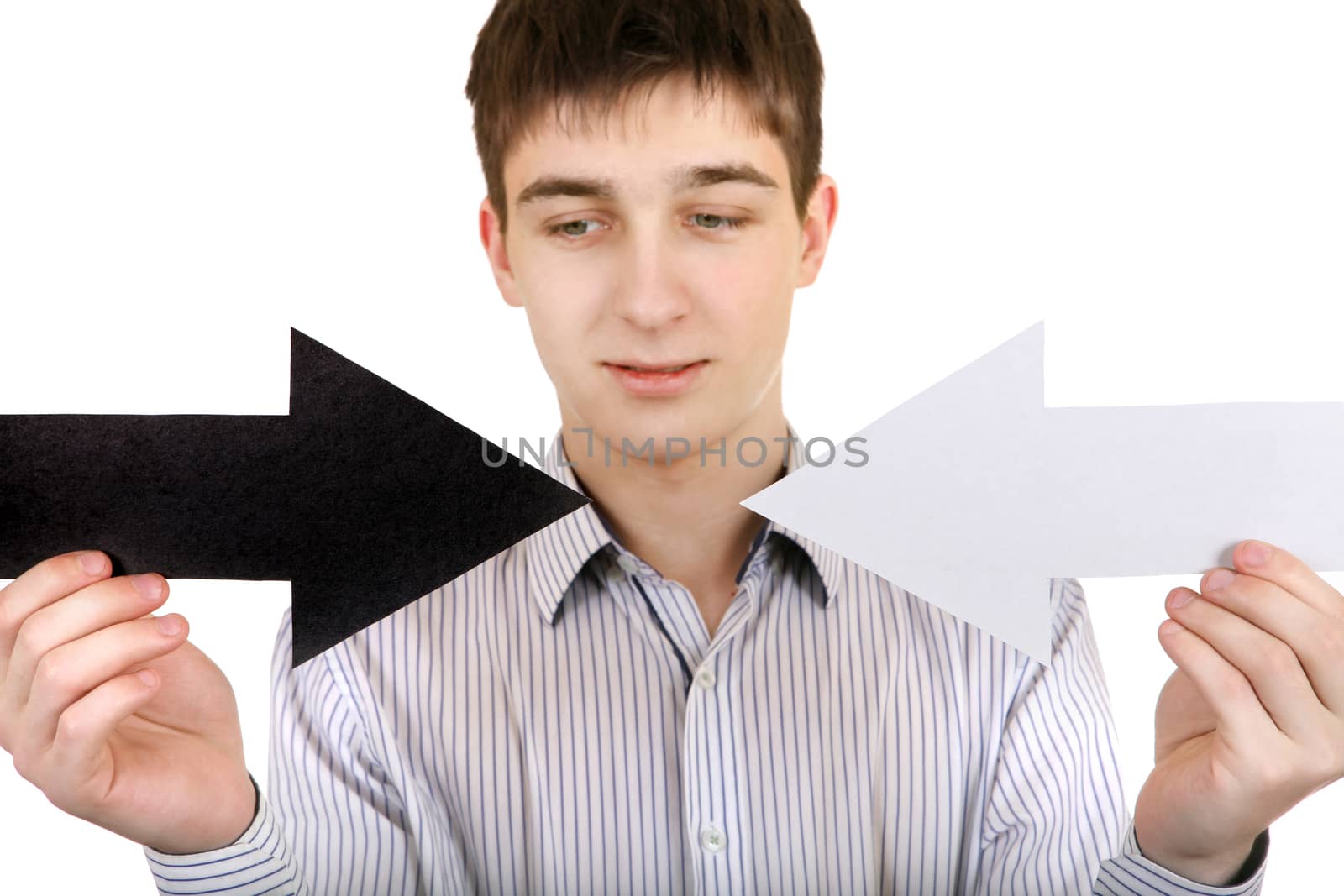 Teenager holds Black and White Arrows Isolated on the White Background