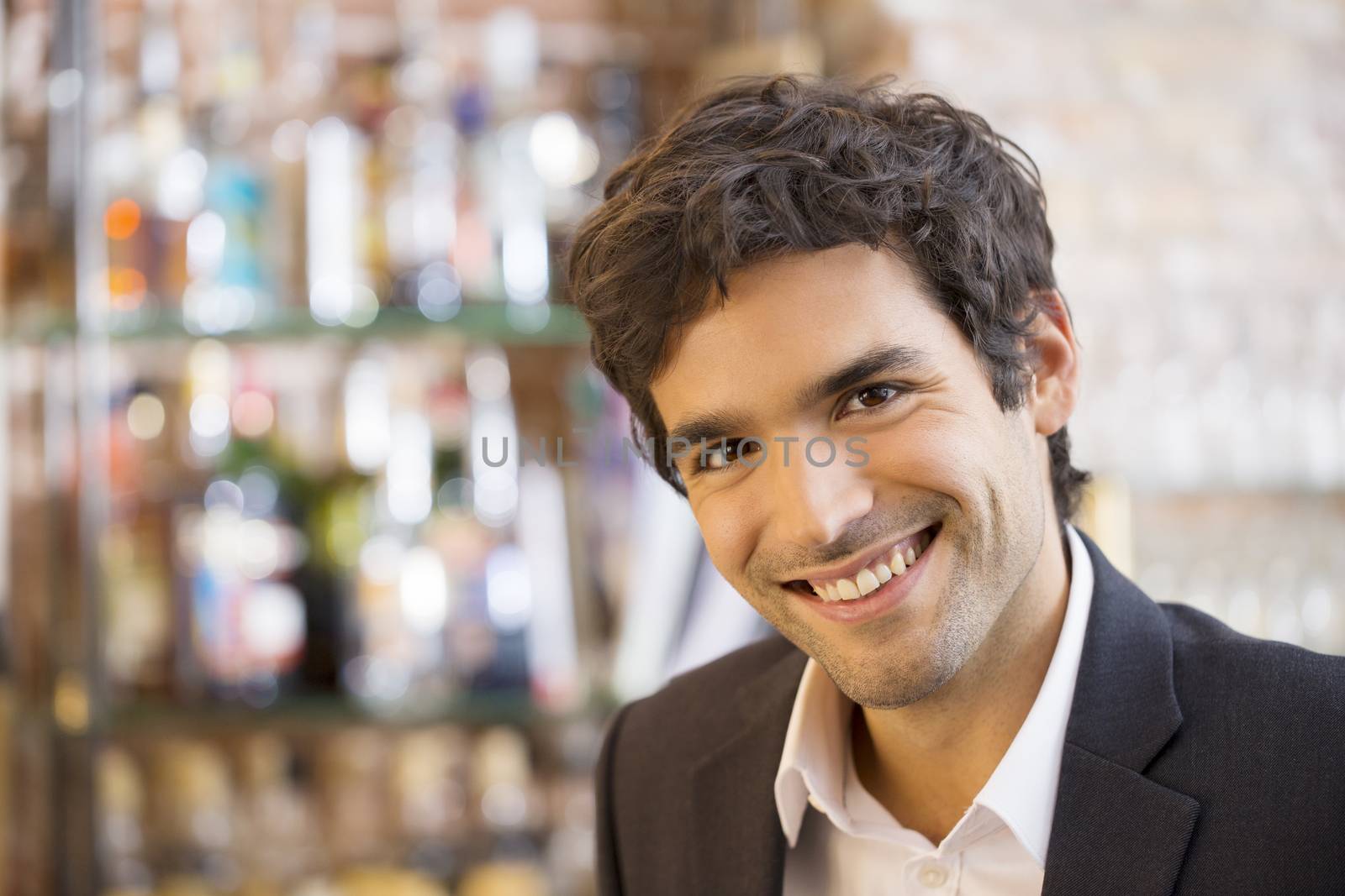 Male smiling cheerful coffee bar looking camera