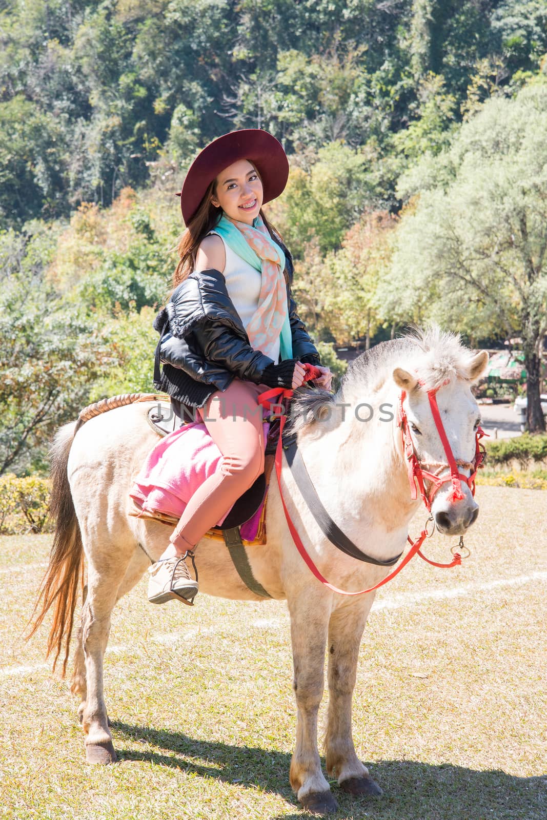Asia women on horseback by jakgree