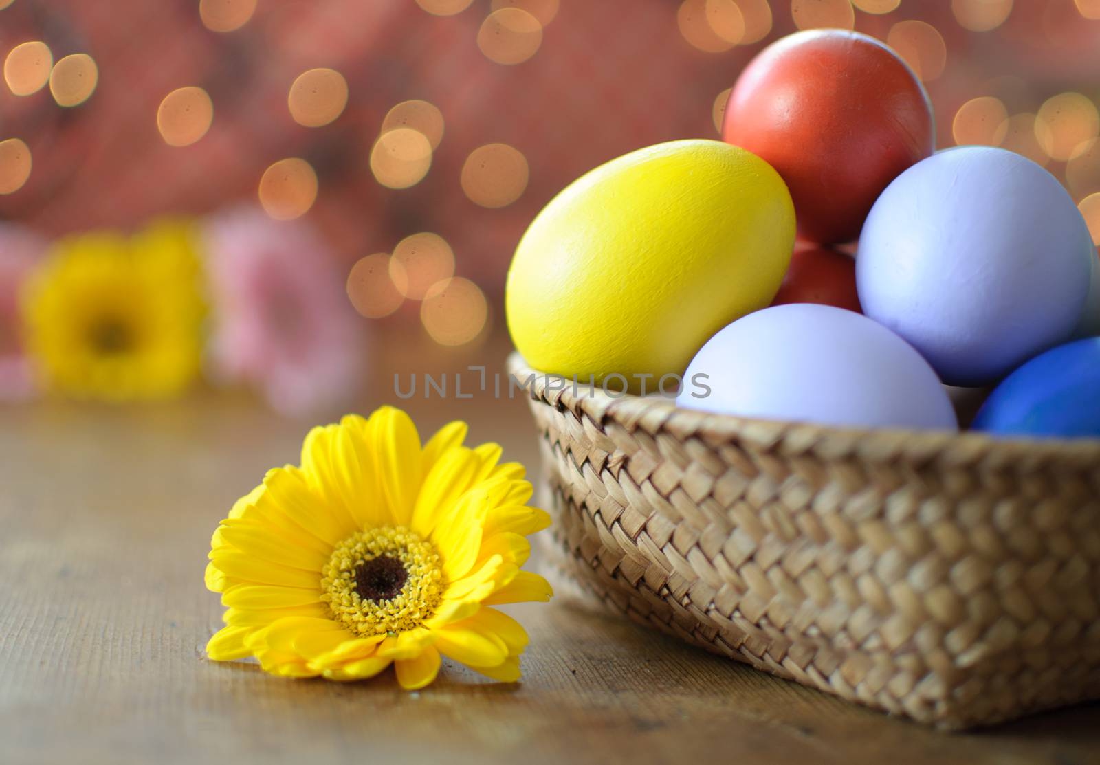 Easter eggs inside a wicker basket 