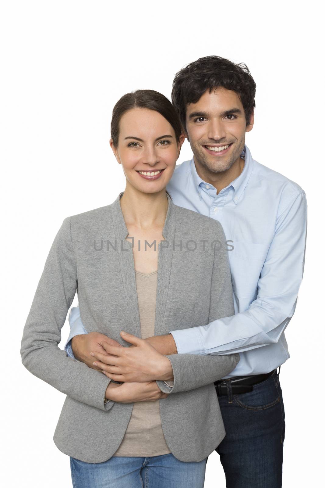 Happy  young lover couple standing on white background, isolated by LDProd