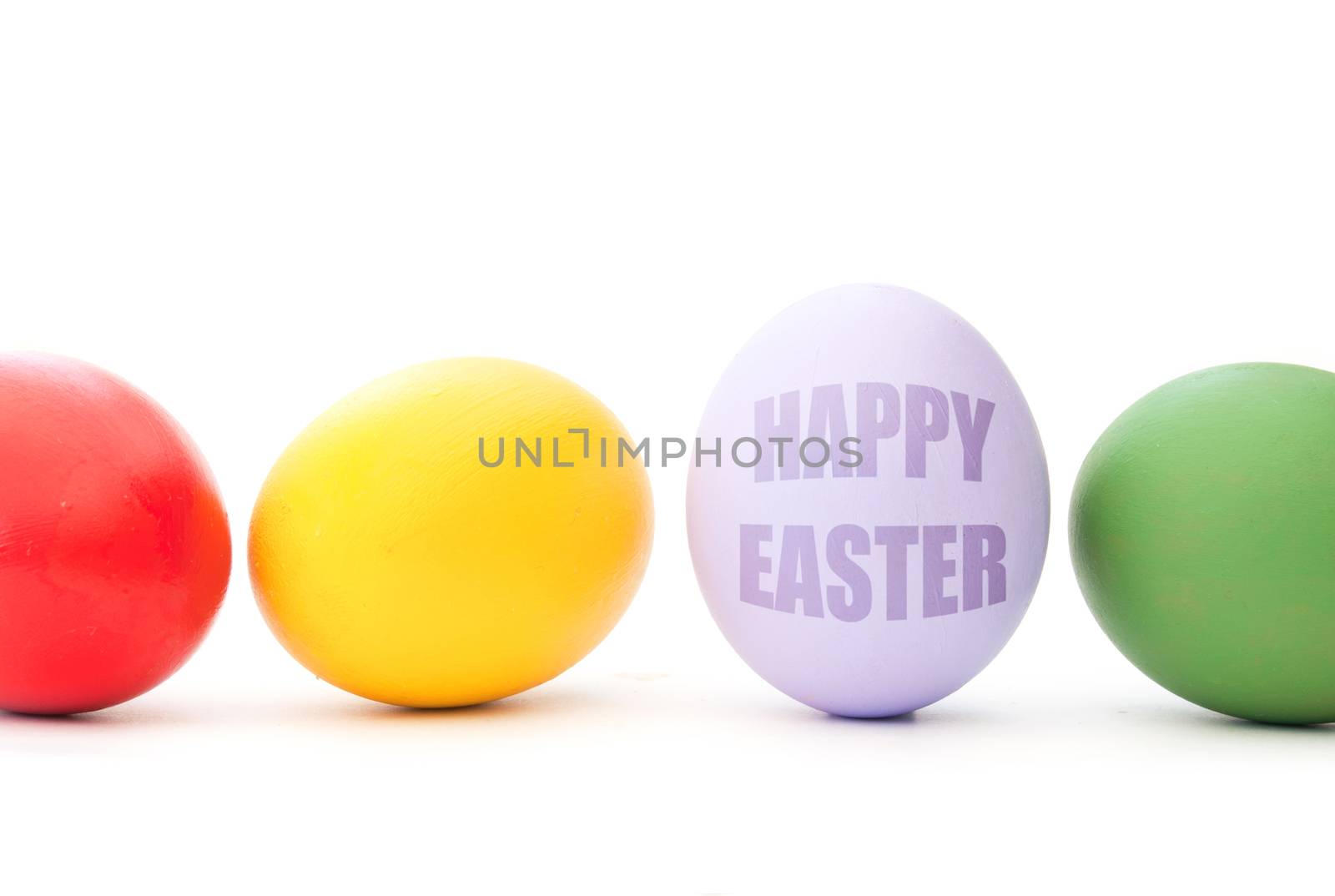 Happy easter printed on a painted easter egg