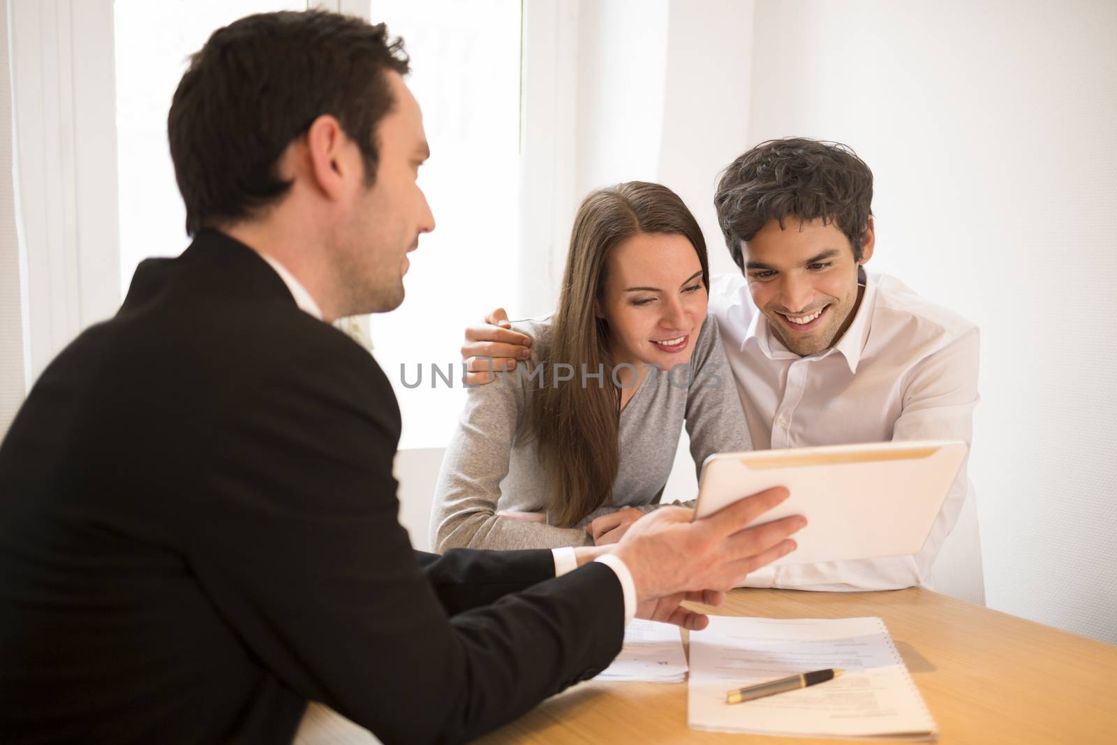 Woman man advisor office  contract house investment computer