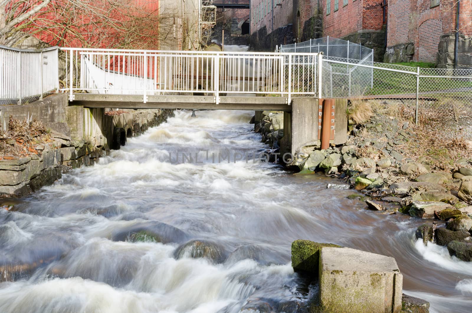 rushing water rushing down from a factory