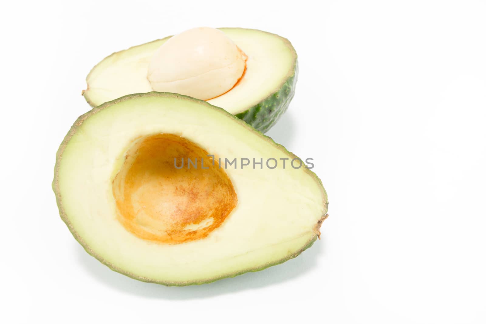 Fresh avocado fruit on white background