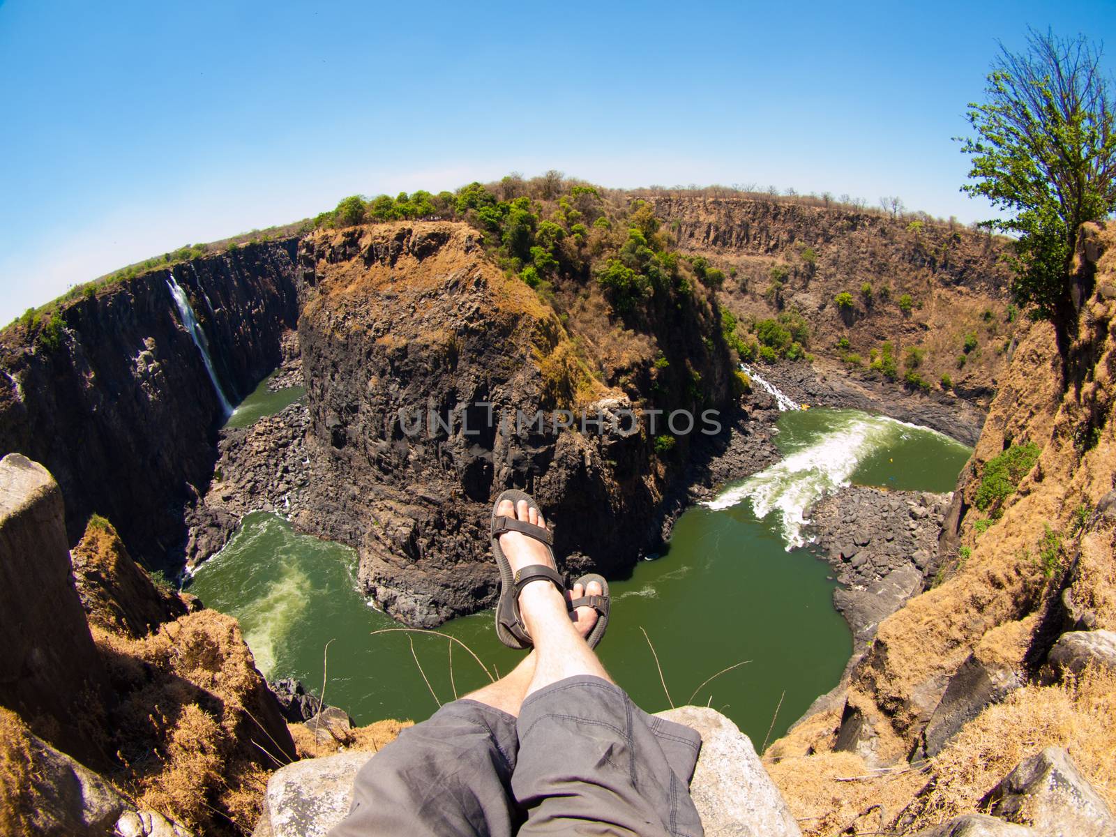 Having a rest at Victoria falls in dry season (fish-eye view)