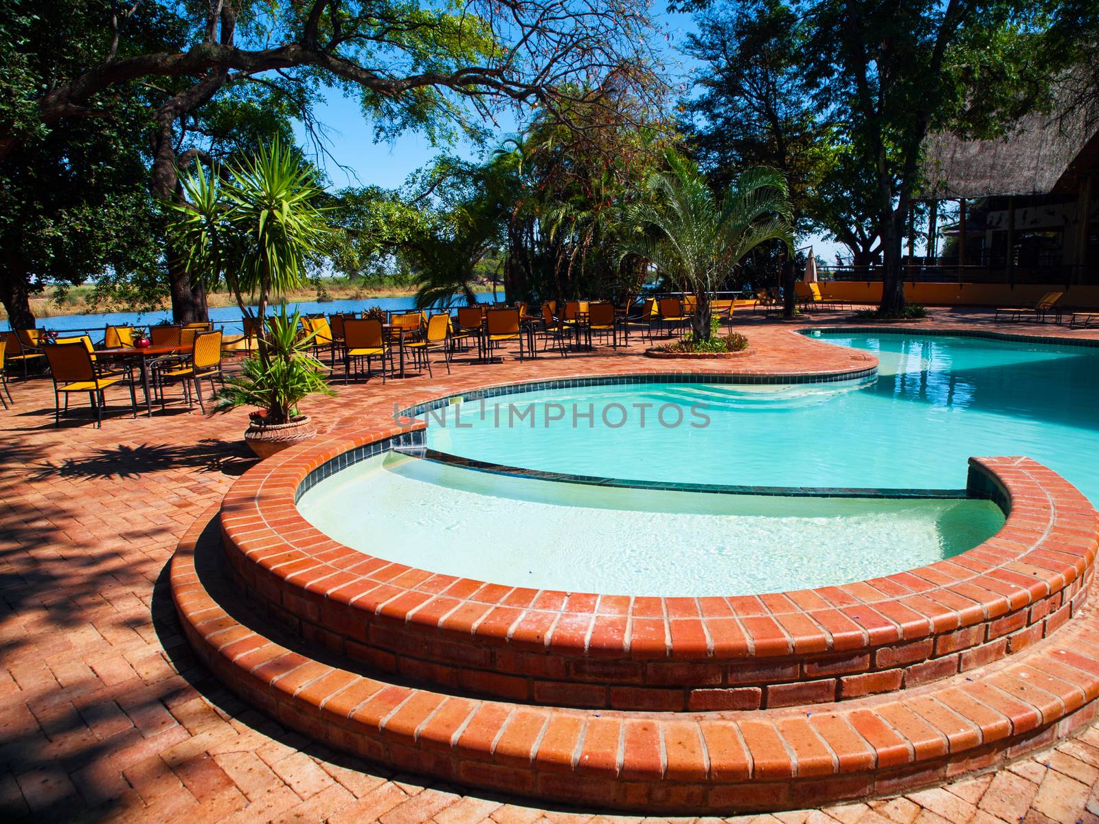 Round pool in african paradise (Kasane, Botswana)