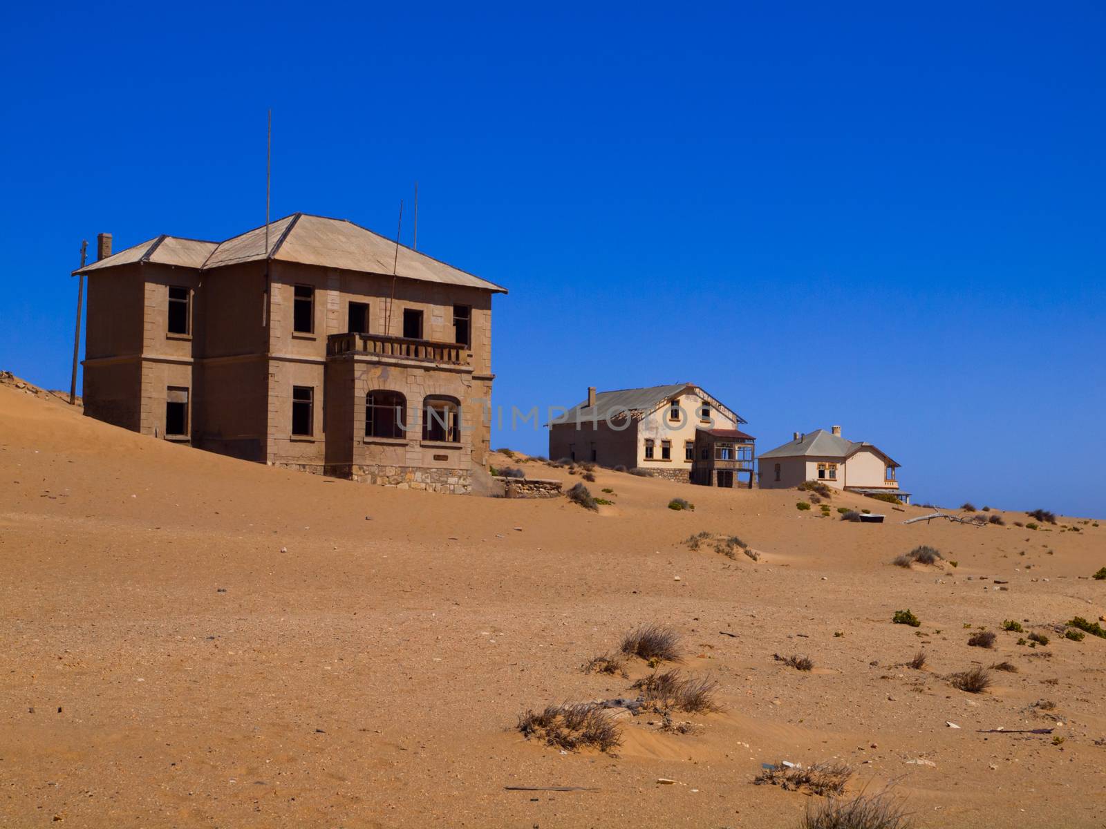 Sand in abandoned house in Kolmanskop ghost town (Namibia)