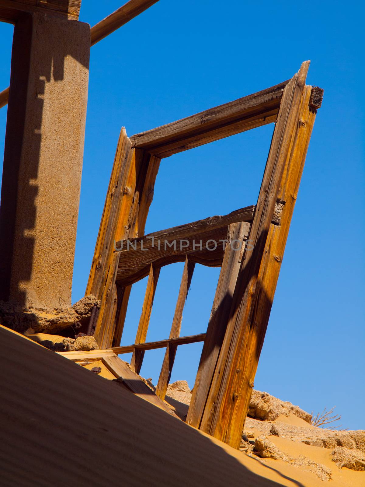 Devasted door in Kolmanskop ghost town (Namibia)