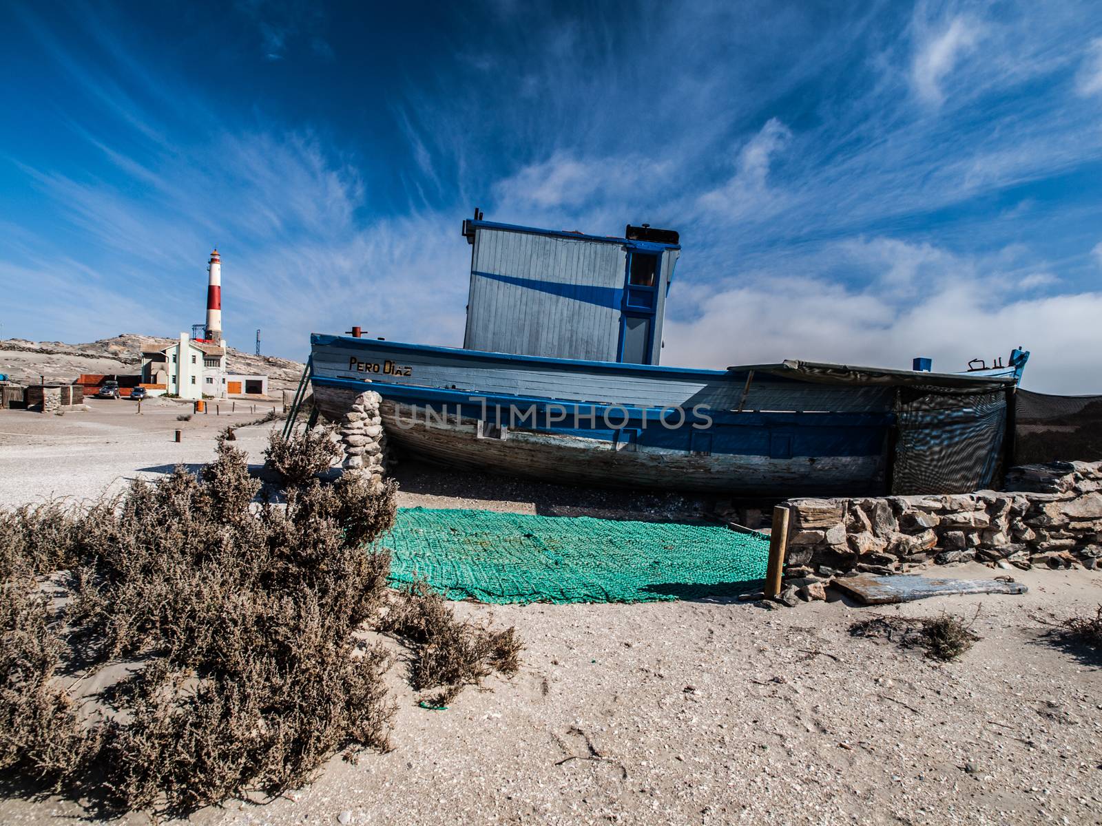 Devasted ship wreck on the beach by pyty