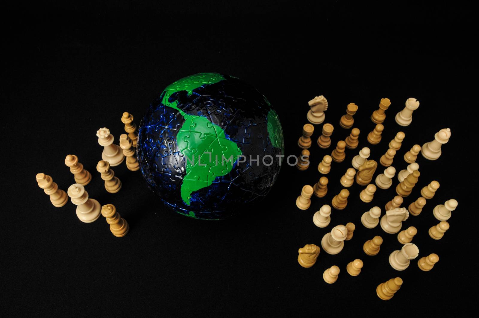 Globe And White Chess on a Black Background