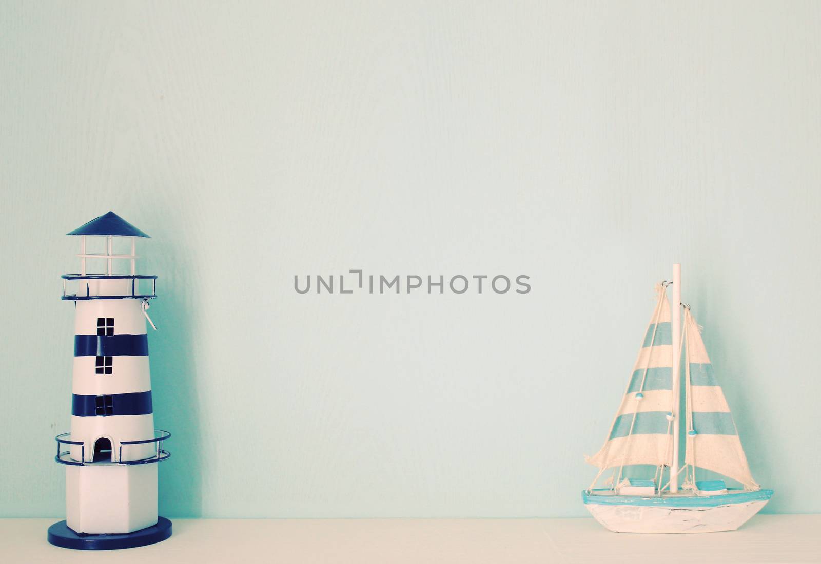 Lighthouse and ship model for decorated in room with retro filter effect