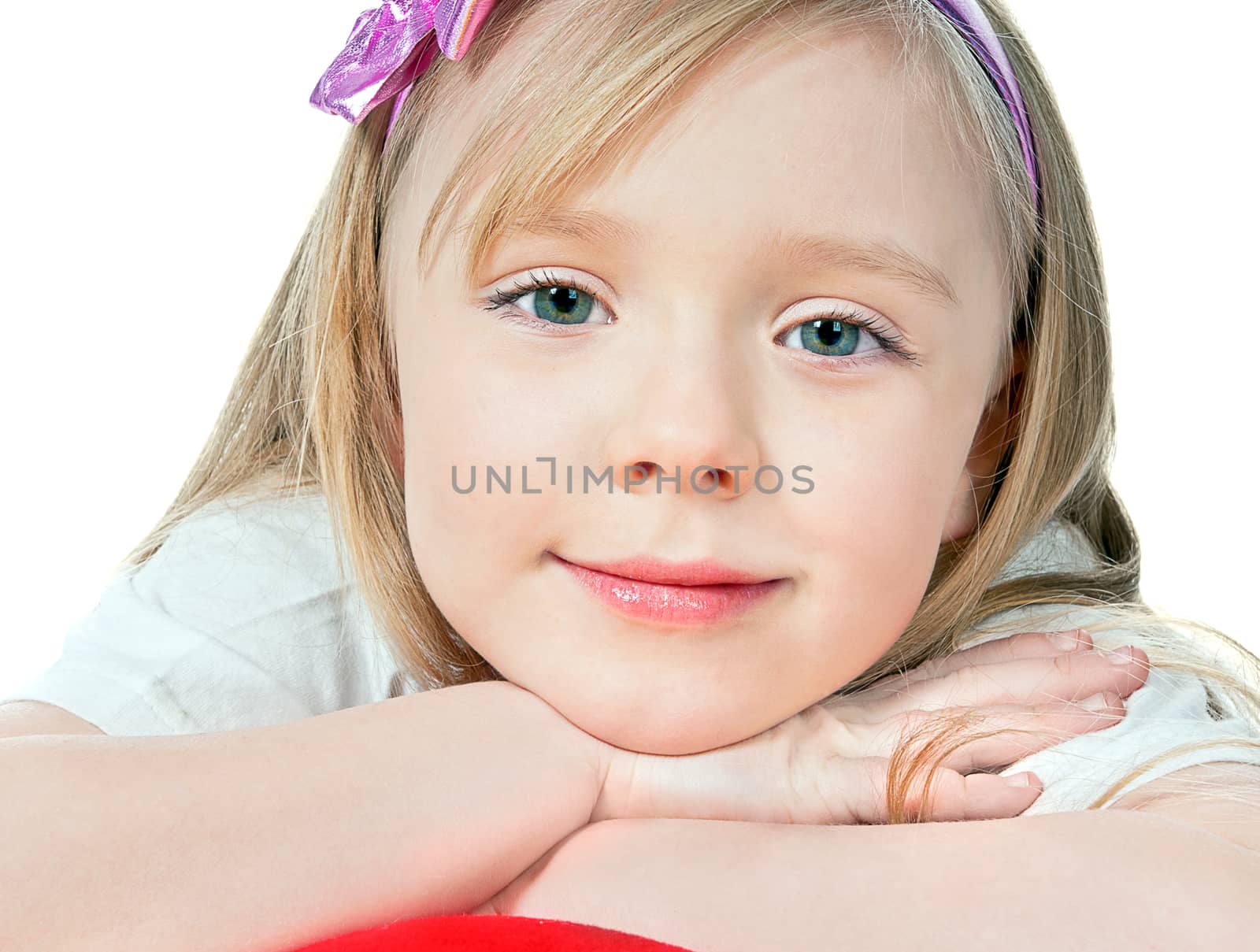 beautiful girl holding a red heart