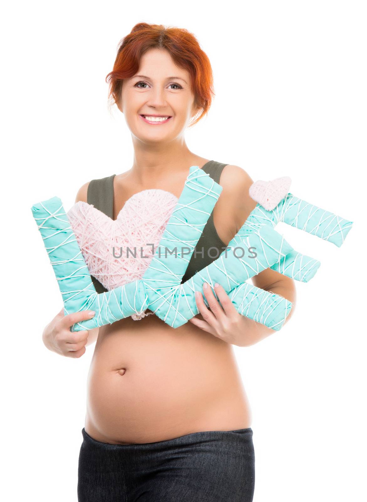 Beautiful pregnant woman holding a word Love isolated on white background