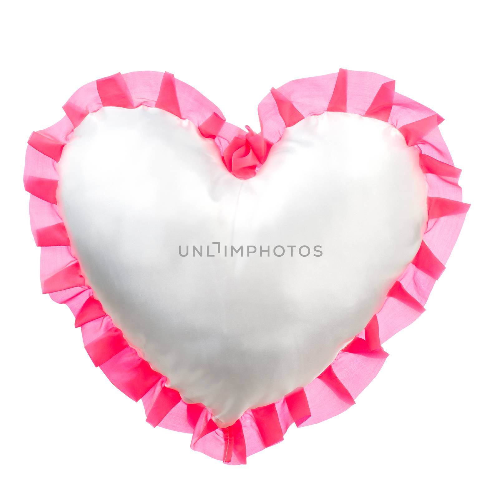 Pink silk pillow in the shape of heart isolated on white