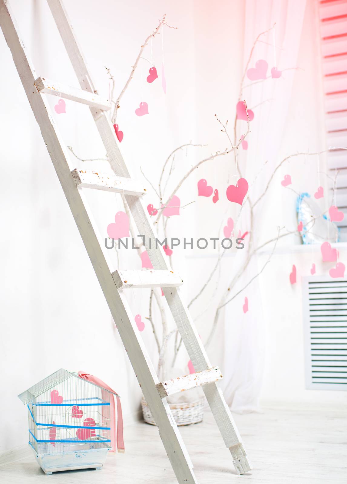 white romantic Valentine's Day interior with pink hearts