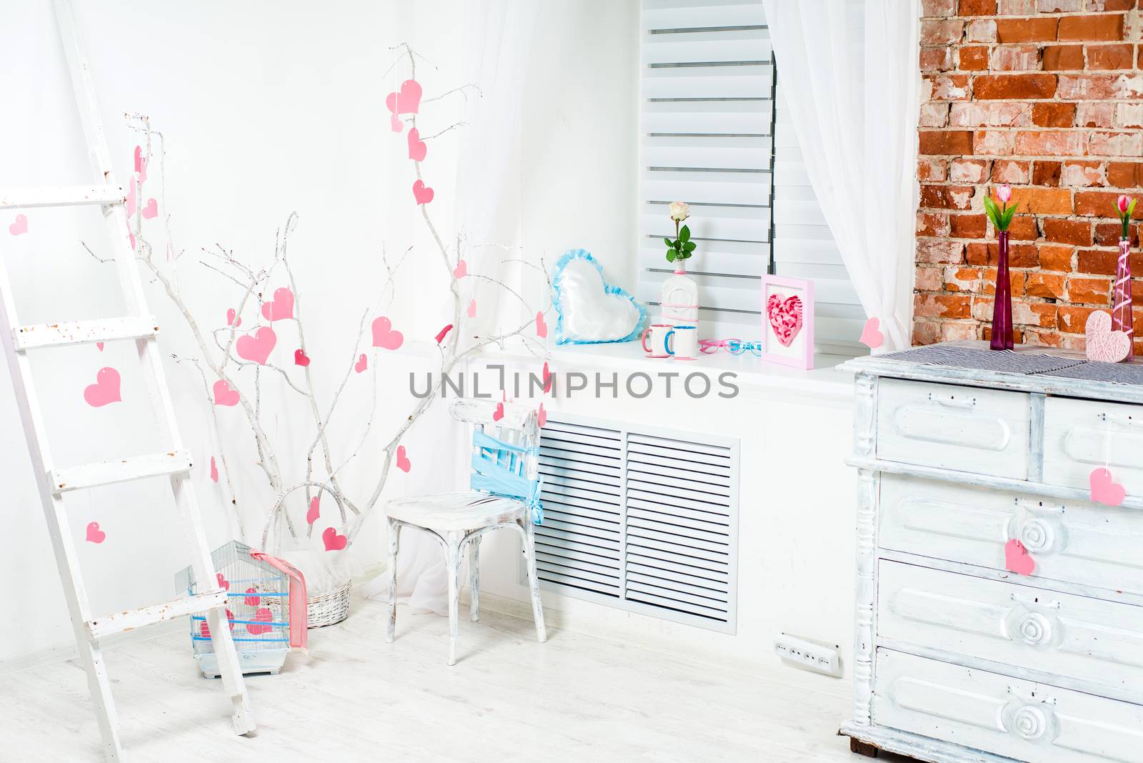 white romantic Valentine's Day interior with pink hearts