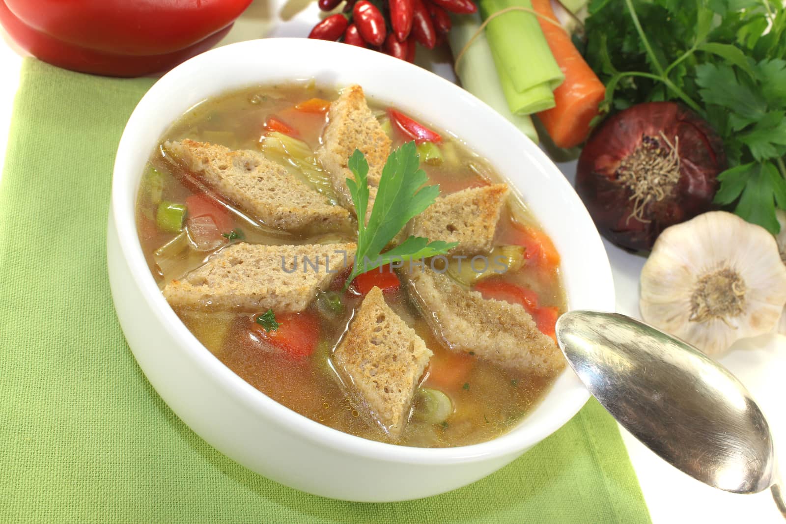 Bread soup with chilli on a light background