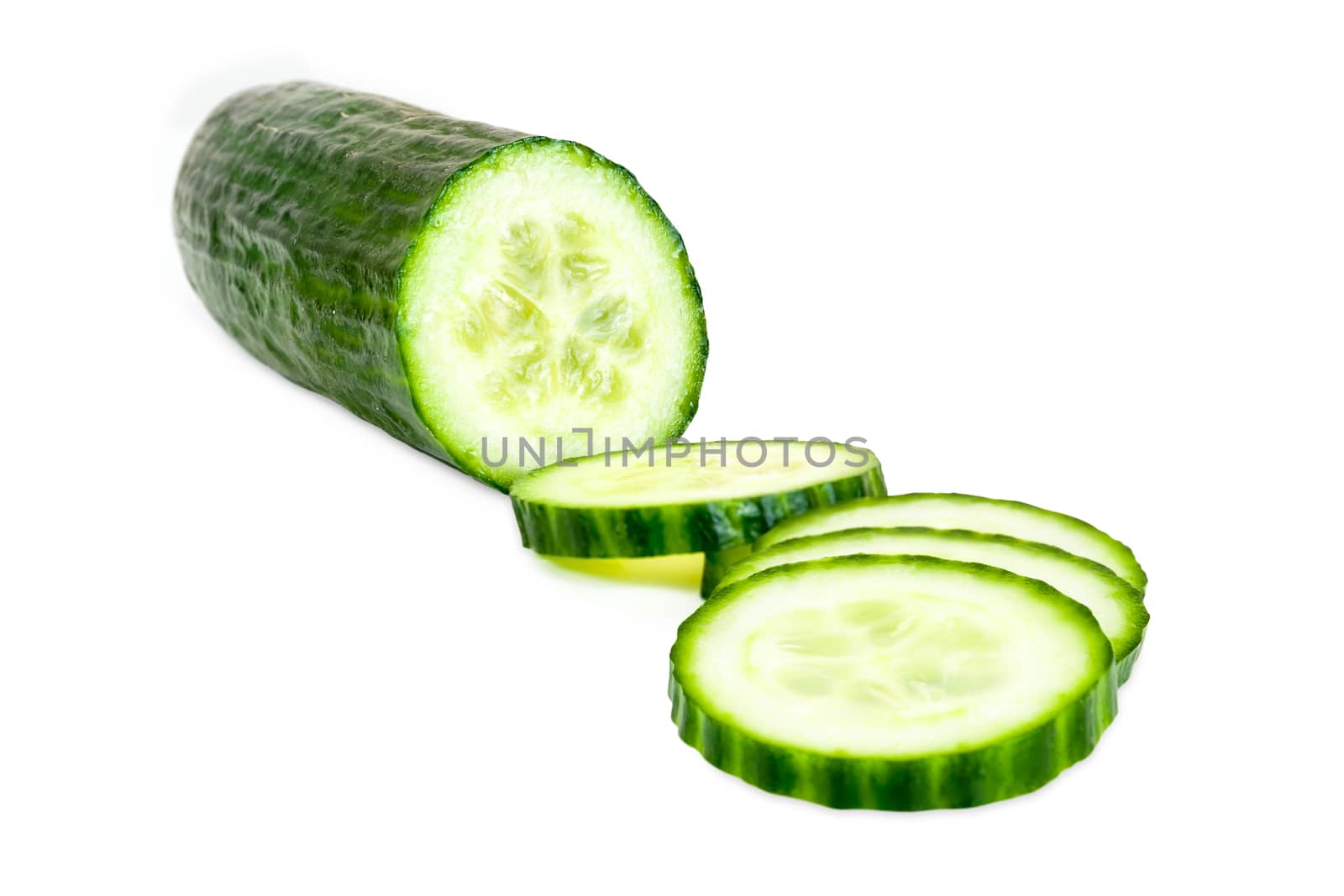 Cut cucumber on white background by mkos83