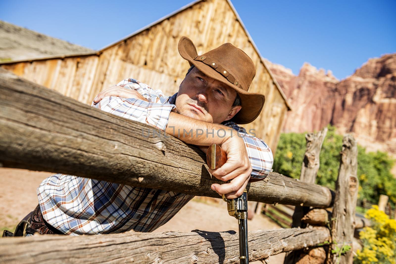 SOUTH WEST - A cowboy takes time to rest and reflect. 