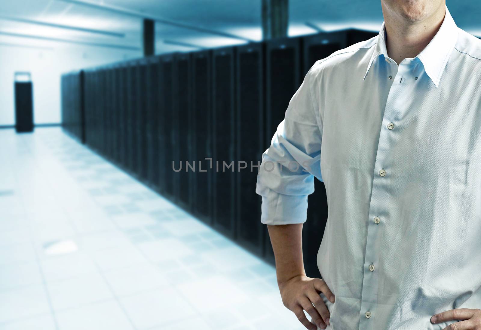 Server room with operating staff in white shirt