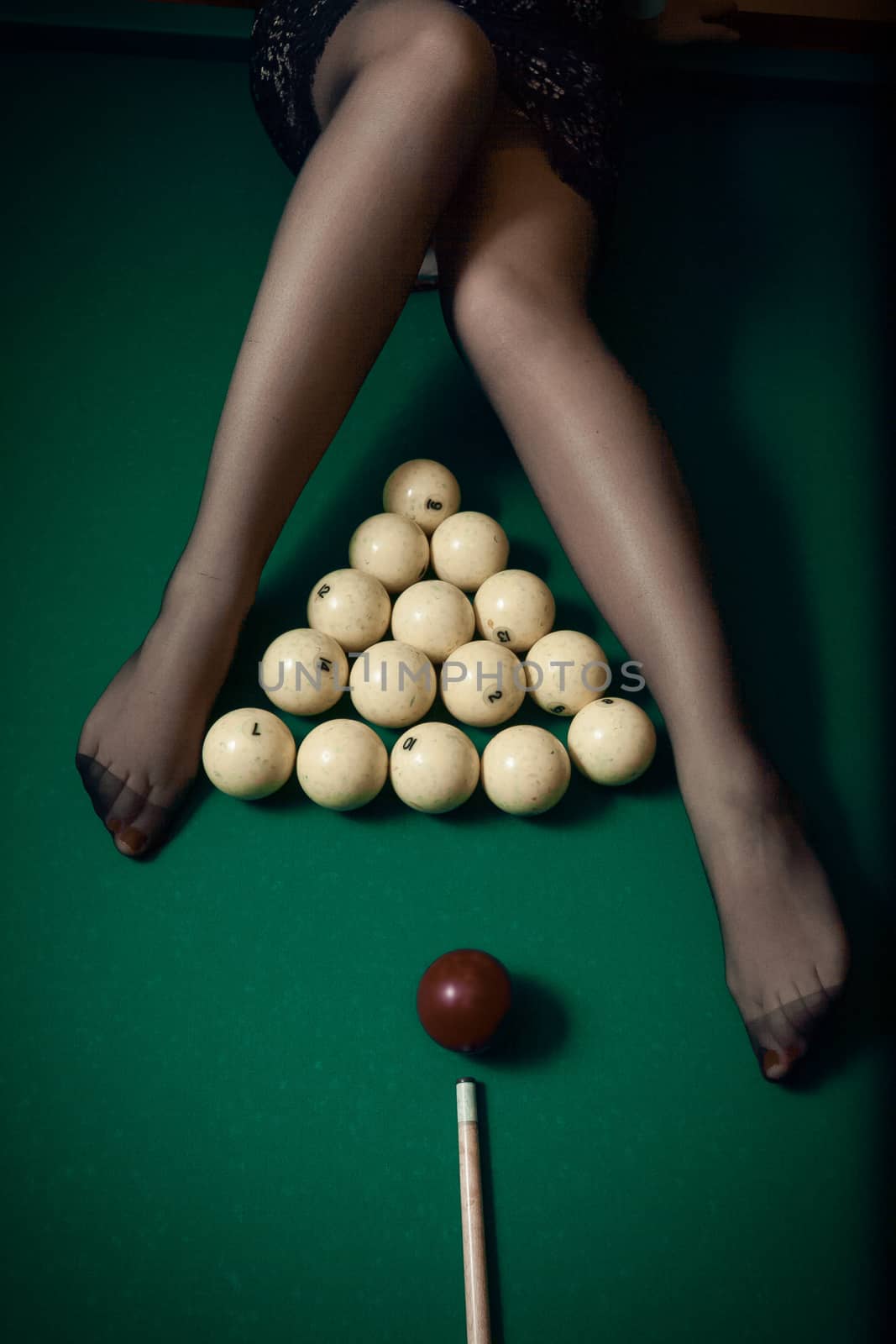 Billiard ball aiming at sexy women legs by Kryzhov