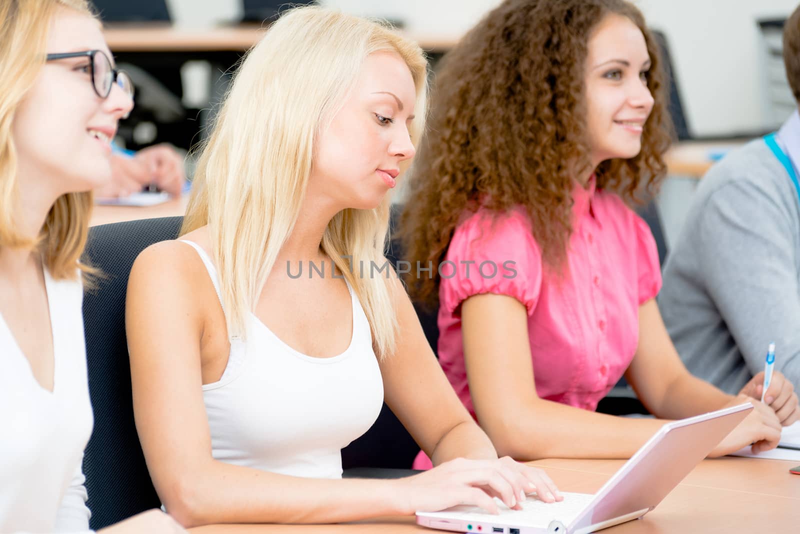 image of a young female students in the classroom, teaching at the University of