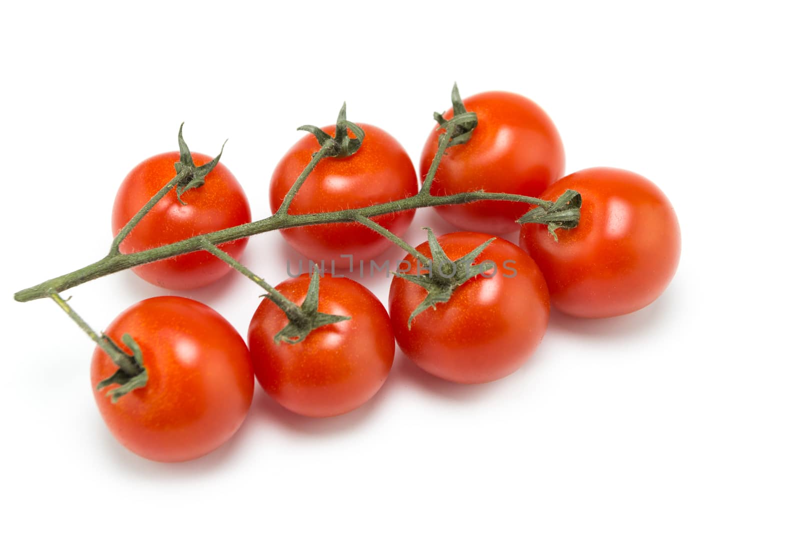 Bunch of fresh tomatoes on white background. Top view. 