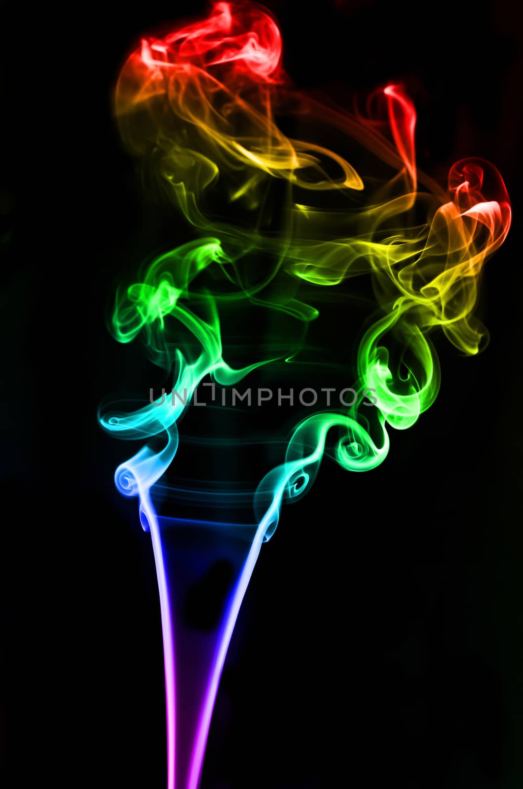 textured of colorful incense smoke on dark background