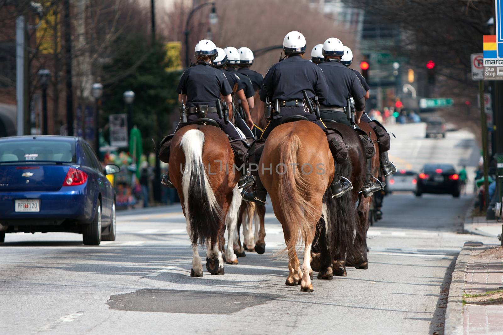 Atlanta Police Ride Horses Down Street Before St. Patrick's Parade by BluIz60