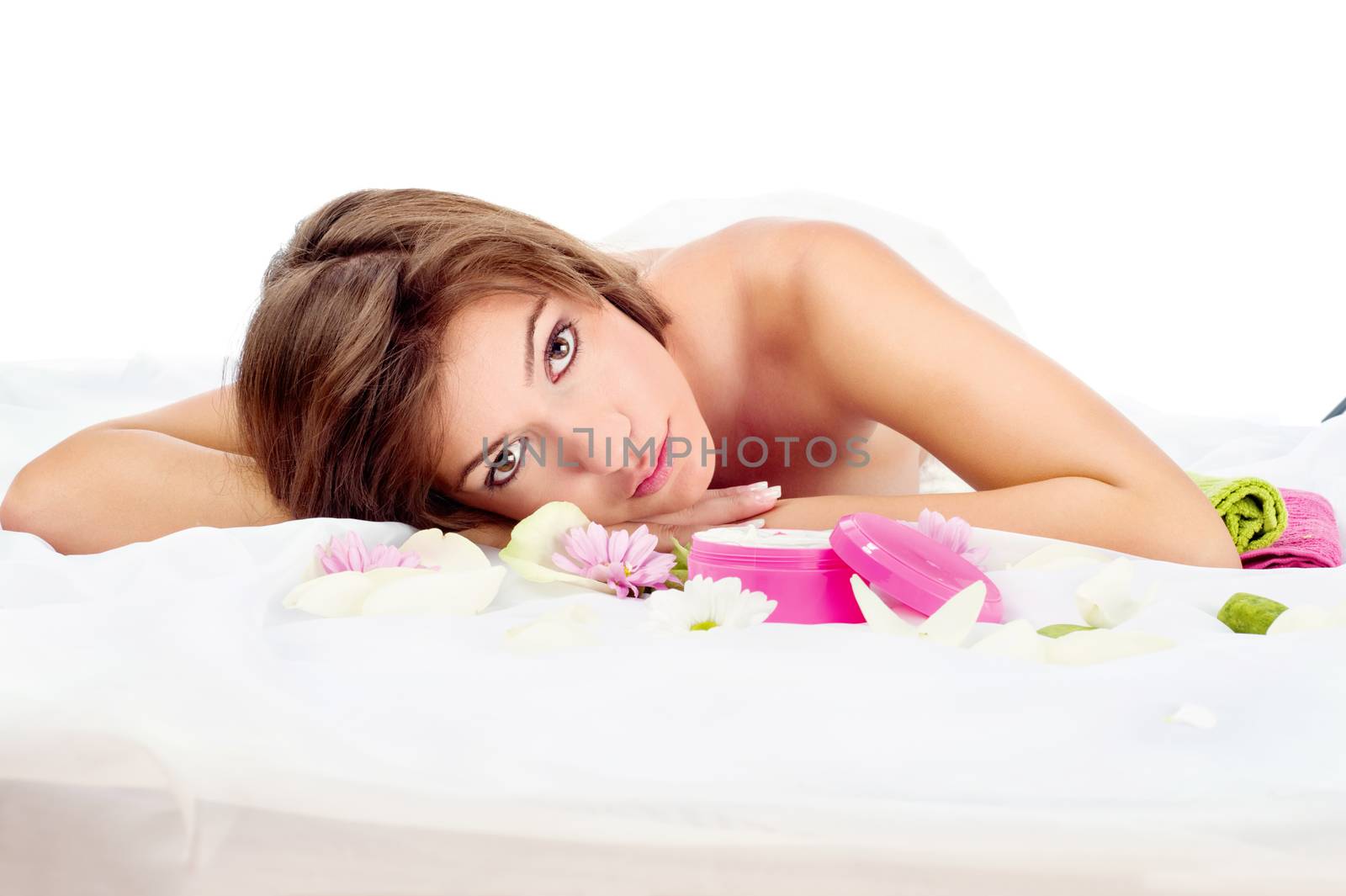 brunette woman lying, spa concept, isolated on white