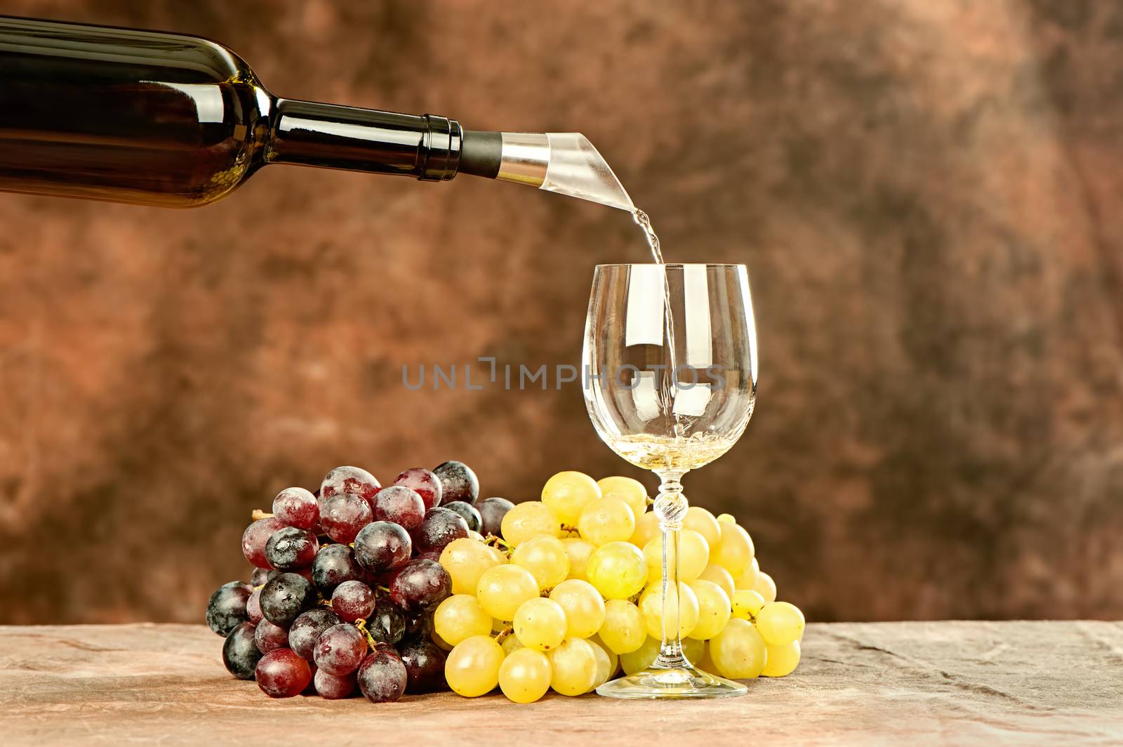pour wine in cup by imarin