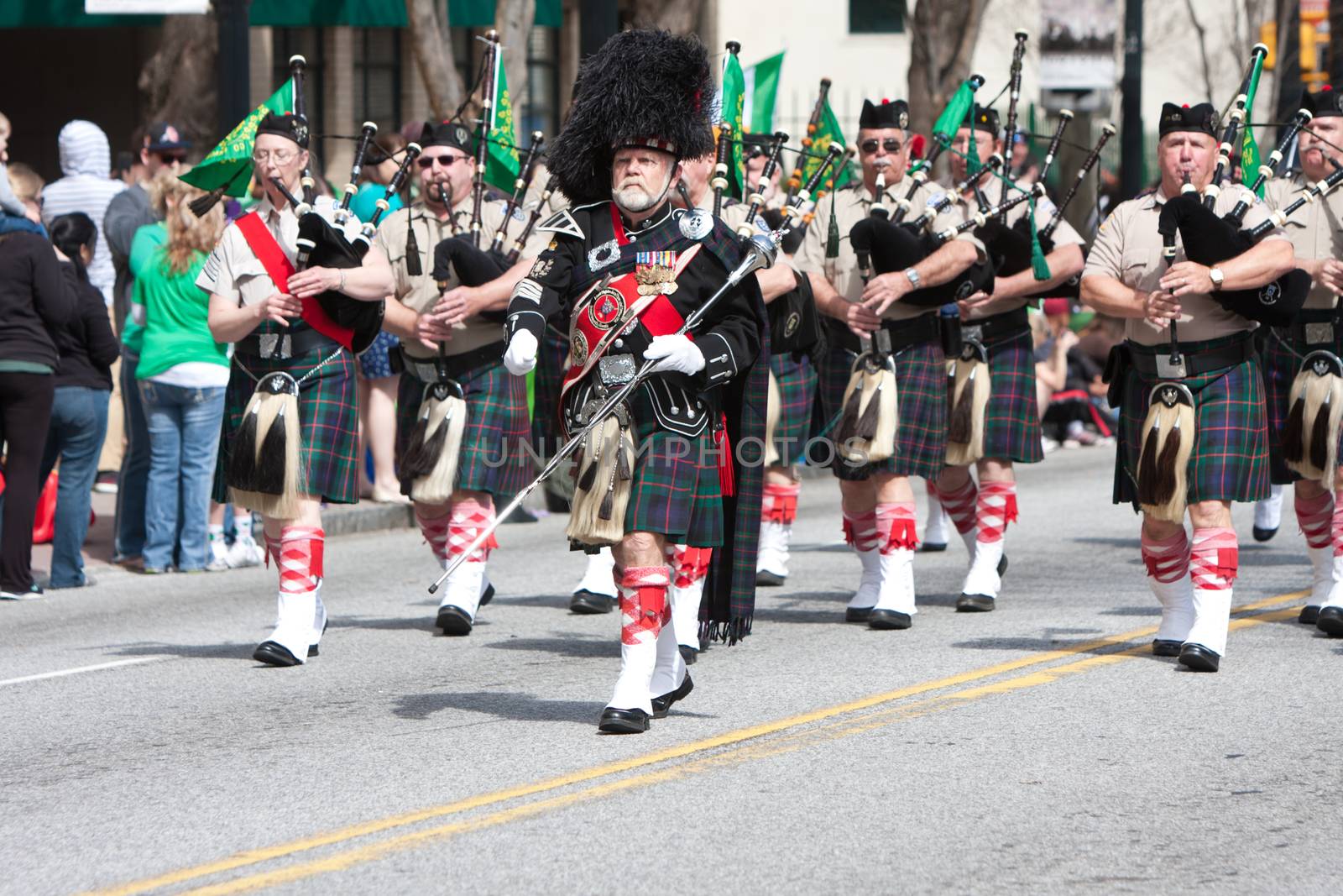 Atlanta, GA - March 15, 2014:  A bagpipes corps marches and performs at the annual Atlanta St. Patrick's parade.