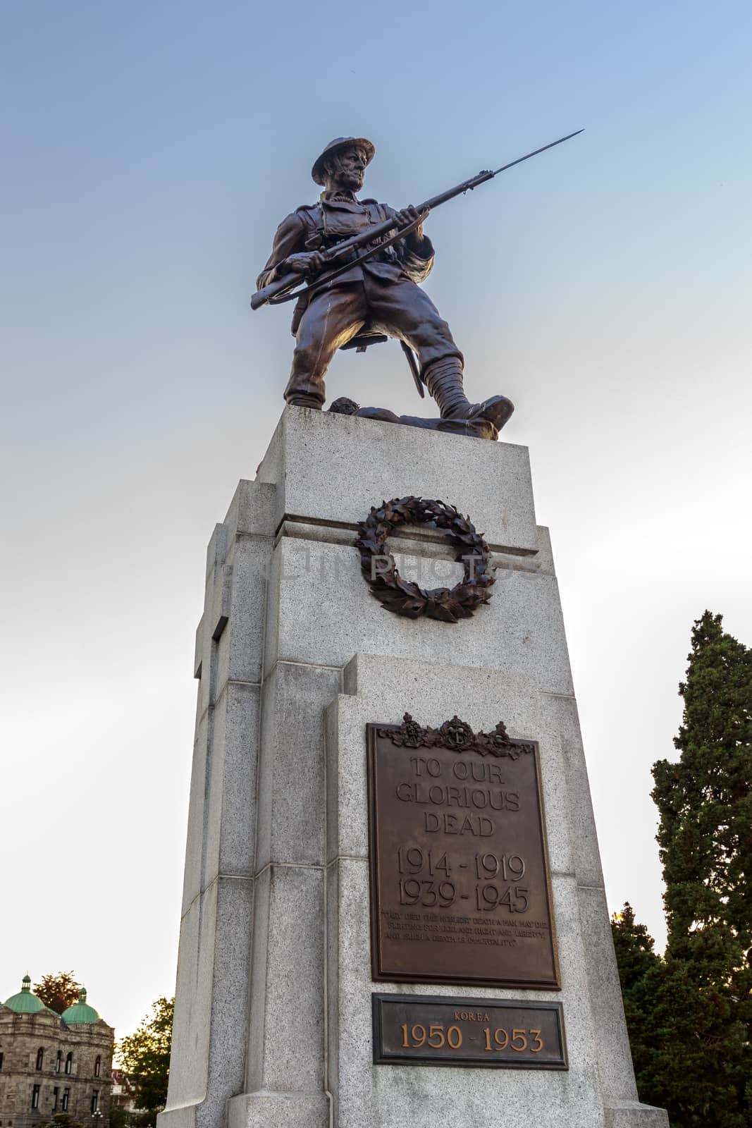 Canadian Soldier Statue for Fallen Canadian Soldiers in World War 1, World War 2 and Korea in Front of Provincial Capital Legislative Parliament Buildiing Victoria British Columbia Canada.
