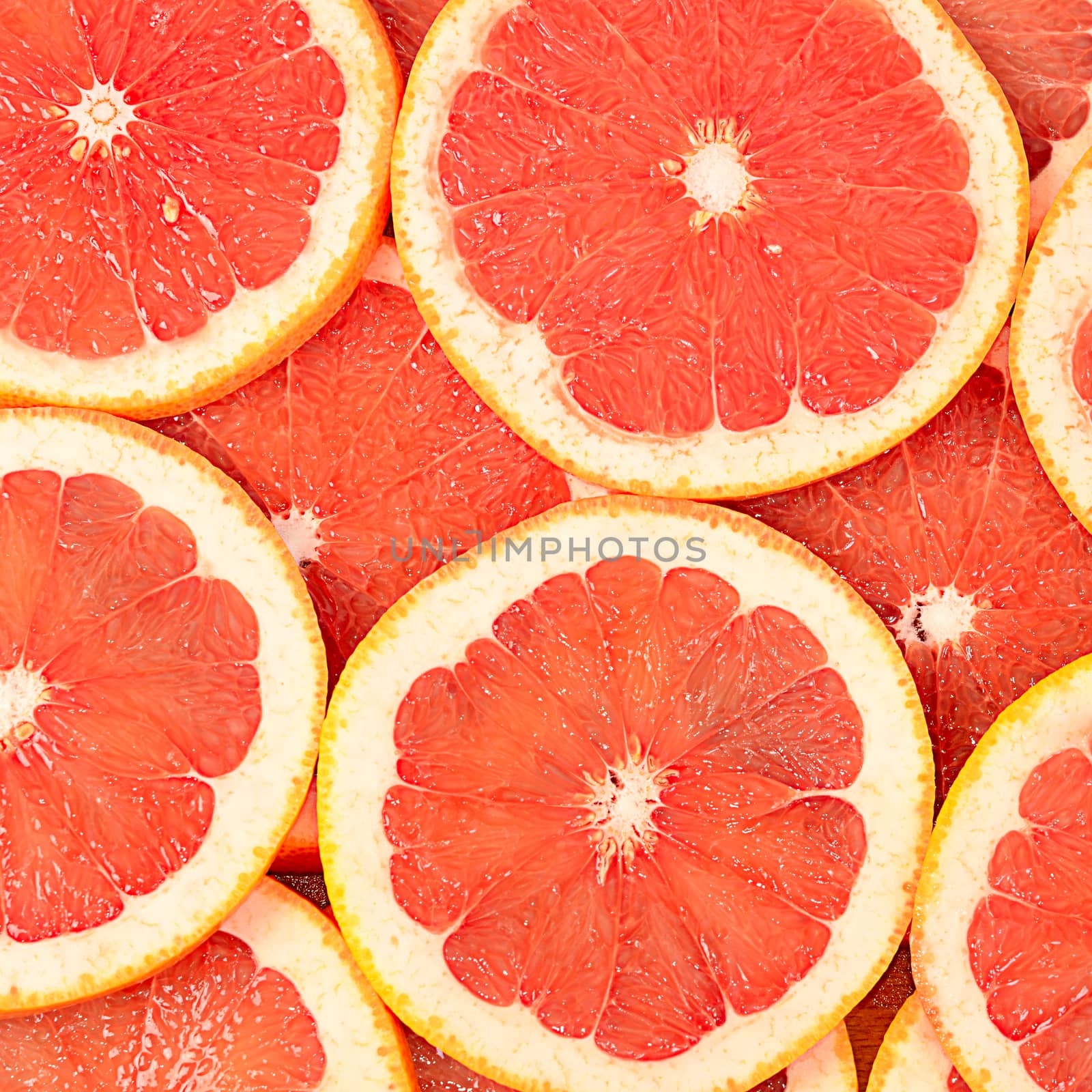 The fresh grapefruit as a background closeup